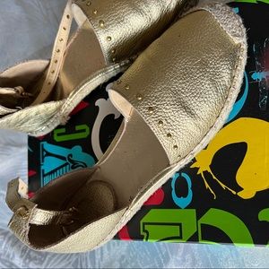 Comfortable gold shoes.